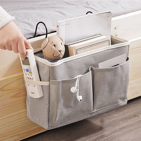 new bedside storage organizer dorm room phone book magazine bag holder with hook bed pocket canva iron frame hanging storage bag
new bedside storage organizer dorm room phone book magazine bag holder with hook bed pocket canva iron frame hanging storage bag