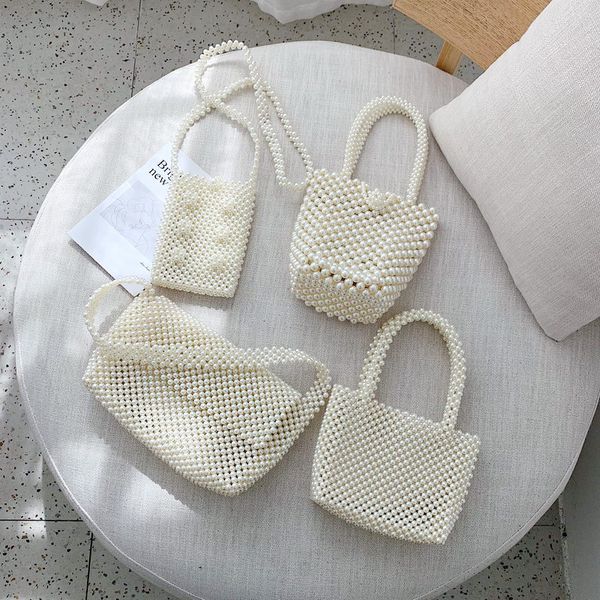 pearl women's bag simple retro hand woven bag summer beaded women's handbag shoulder cross phone purses and handbags
pearl women's bag simple retro hand woven bag summer beaded women's handbag shoulder cross phone purses and handbags