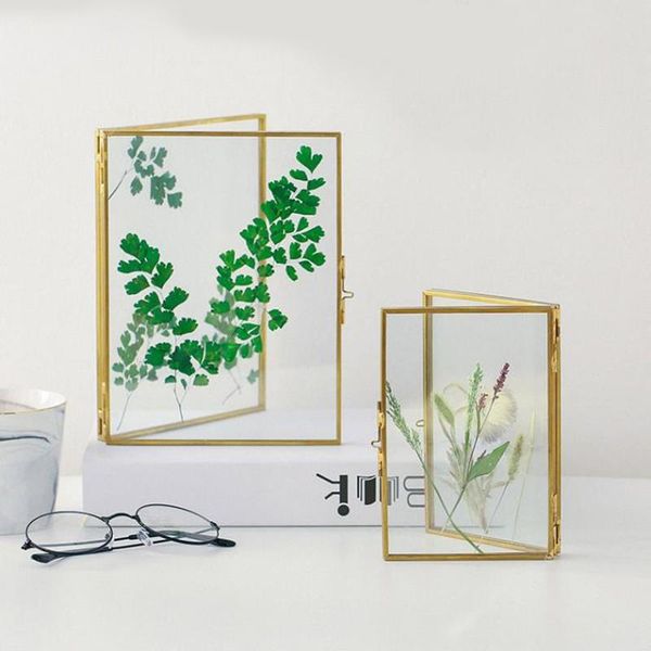 сложенное двустороннее стекло металл photo frame, ботанические типовой держатель, гальваническое золото покрытых стойки дисплея
сложенное двустороннее стекло металл photo frame, ботанические типовой держатель, гальваническое золото покрытых стойки дисплея