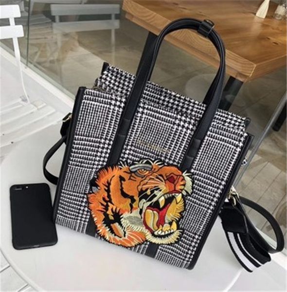 designer handbag tiger head embroidery velvet tote bag spring and summer shoulder slant span portable thousand bird plaid canvas bags 3
designer handbag tiger head embroidery velvet tote bag spring and summer shoulder slant span portable thousand bird plaid canvas bags 3
