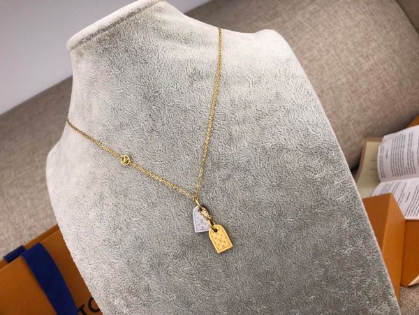 nanogram necklace with round bead chain paired with a pair of rapper miniature name tags engraved with the initials logo circle gold silver
nanogram necklace with round bead chain paired with a pair of rapper miniature name tags engraved with the initials logo circle gold silver