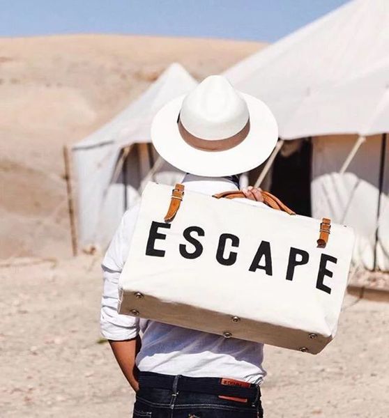 escape canvas travel bag large capacity stylish travel luggage traveling duffel bag letter printing weekend duffel handbags
escape canvas travel bag large capacity stylish travel luggage traveling duffel bag letter printing weekend duffel handbags