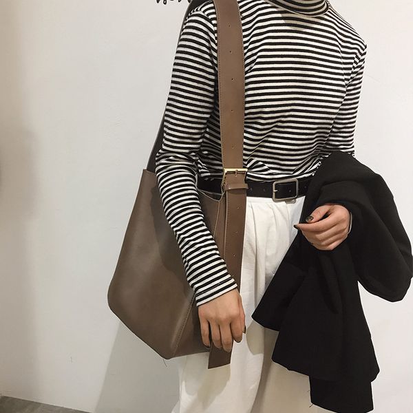 vintage minimalist sub-mother bag wide shoulder strap bucket girl bag shoulder slant big
vintage minimalist sub-mother bag wide shoulder strap bucket girl bag shoulder slant big