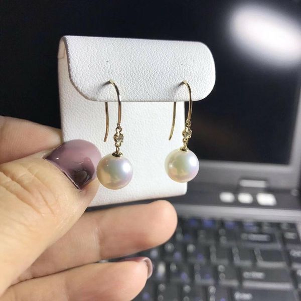 charming pair of 10-11mm south sea round white pearl diamond earring 18k, Golden;silver
charming pair of 10-11mm south sea round white pearl diamond earring 18k, Golden;silver