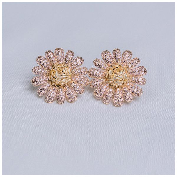 european and american heavy industry s925 silver needle micro inlaid with pink zircon stereo large sun flower earrings wholesale, Golden;silver
european and american heavy industry s925 silver needle micro inlaid with pink zircon stereo large sun flower earrings wholesale, Golden;silver
