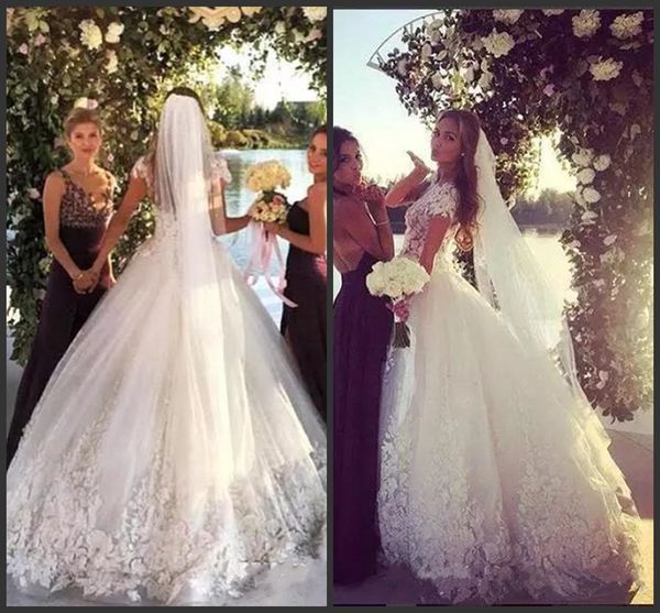 2020 new princess white lace ball gown wedding dresses sheer neck beach tulle bridal gowns bling sweep train wedding dress 
2020 new princess white lace ball gown wedding dresses sheer neck beach tulle bridal gowns bling sweep train wedding dress