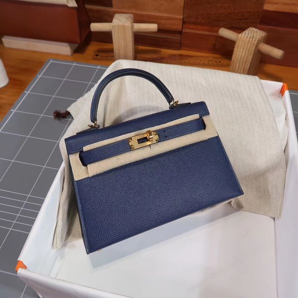 wholesale handmade original epsom skin with wax line thread navy blue mini keily bag 19cm,with gold and silver hardware ,fast delivery
wholesale handmade original epsom skin with wax line thread navy blue mini keily bag 19cm,with gold and silver hardware ,fast delivery