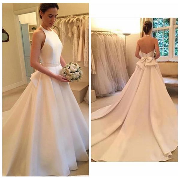 elegant white a-line satin wedding dresses court train with back bow backless robes de mariée sirène halter wedding dresses
elegant white a-line satin wedding dresses court train with back bow backless robes de mariée sirène halter wedding dresses
