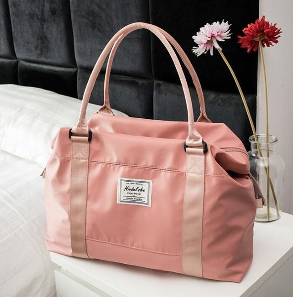 simple short-distance women travel bag multifunction lightweight large capacity waterproof hanging luggage
simple short-distance women travel bag multifunction lightweight large capacity waterproof hanging luggage