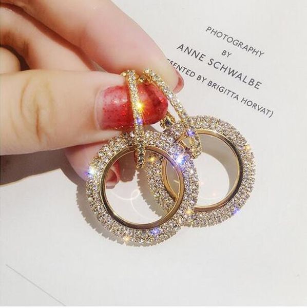 new design creative jewelry high-grade elegant crystal earrings round gold and silver earrings wedding party earrings for woman gb60
new design creative jewelry high-grade elegant crystal earrings round gold and silver earrings wedding party earrings for woman gb60