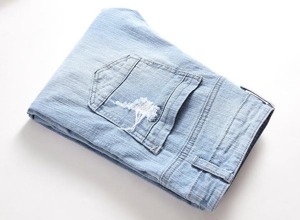 men fashion style jeans light blue hole summere button straight new designer homme clothing casual apparel
men fashion style jeans light blue hole summere button straight new designer homme clothing casual apparel