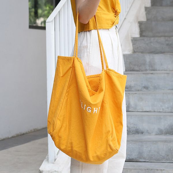korean version of the simple wash canvas bag candy color large capacity handbag casual letter shoulder bag women's handbag 2019
korean version of the simple wash canvas bag candy color large capacity handbag casual letter shoulder bag women's handbag 2019
