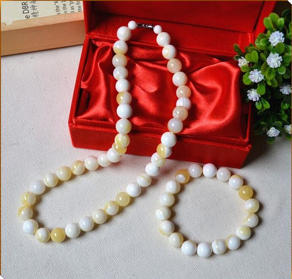 1023 natural gold shell necklace, hainan shell without dyeing, natural golden silk necklace bracelet set, Silver
1023 natural gold shell necklace, hainan shell without dyeing, natural golden silk necklace bracelet set, Silver