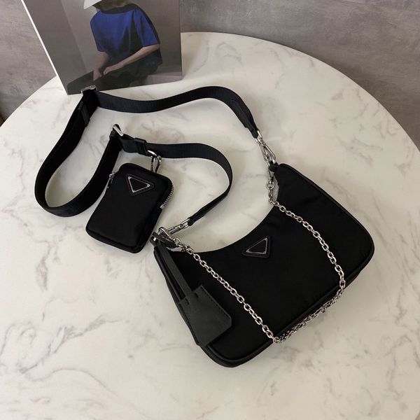 new fashion designer ladies handbag shoulder bag mini strap crossbody bags imported nylon tarpaulin 2 in 1 crossbody bags 25cm
new fashion designer ladies handbag shoulder bag mini strap crossbody bags imported nylon tarpaulin 2 in 1 crossbody bags 25cm