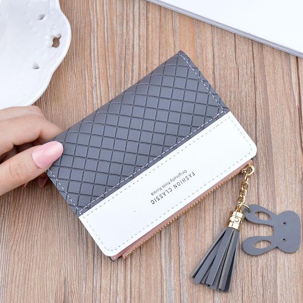 the new miss han edition wallet female short paragraph thin hit color embossed purse tassel zipper small wallet wallet student
the new miss han edition wallet female short paragraph thin hit color embossed purse tassel zipper small wallet wallet student