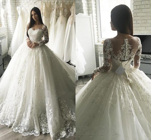 2020 vintage arabic princess a line wedding dresses lace appliqued long sleeve sheer back with button covered belt long dubai brides gowns, White
2020 vintage arabic princess a line wedding dresses lace appliqued long sleeve sheer back with button covered belt long dubai brides gowns, White