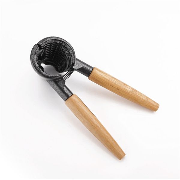 Wooden handle Aluminum alloy Walnut clip Nutcracker kitchen tools Dried fruit tools Household Nutcracker Walnut clip
Wooden handle Aluminum alloy Walnut clip Nutcracker kitchen tools Dried fruit tools Household Nutcracker Walnut clip