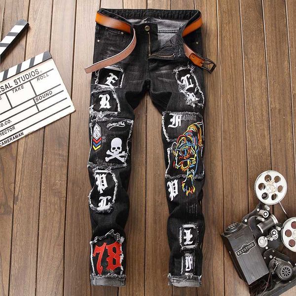 fashion men's punk jeans tiger skull embroidery jeans nightclub patchwork letter print black denim pants for male, Blue
fashion men's punk jeans tiger skull embroidery jeans nightclub patchwork letter print black denim pants for male, Blue