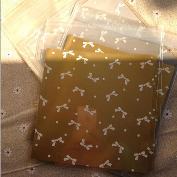 useful new cute bow design cake gift packages opp bags plastic candy cookies biscuits bags wedding party supplies cookie bag
useful new cute bow design cake gift packages opp bags plastic candy cookies biscuits bags wedding party supplies cookie bag