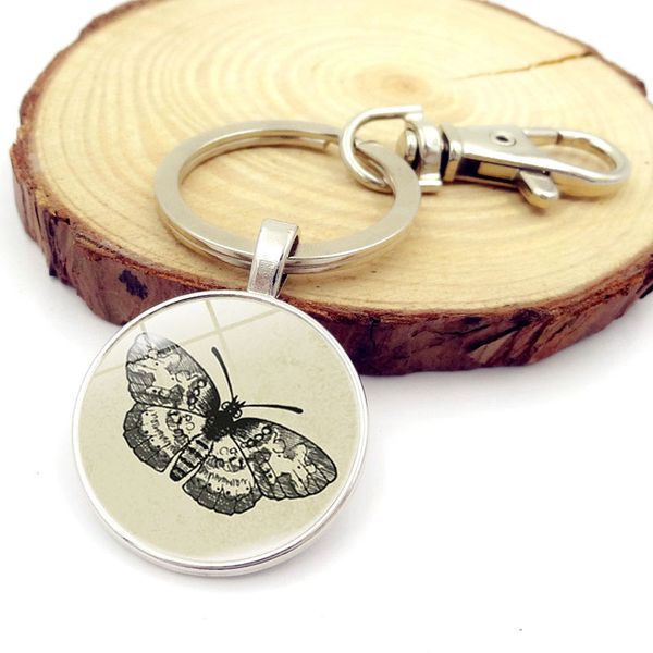 cibocibo butterfly print keychain for men new fashion round keychain classic silver color jewelry for women gift
cibocibo butterfly print keychain for men new fashion round keychain classic silver color jewelry for women gift