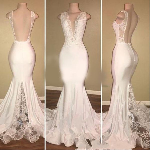 2020 new mermaid wedding dresses v-neck appliques open back castle lace vestido de novia beach white bridal gowns cheap
2020 new mermaid wedding dresses v-neck appliques open back castle lace vestido de novia beach white bridal gowns cheap