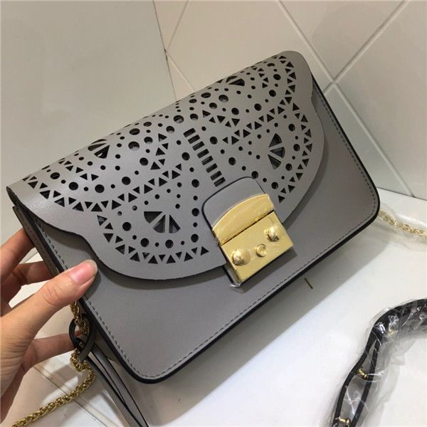 2020 fashion new leather shoulder bag chain joker hollow messenger bag ladies casual small square bag
2020 fashion new leather shoulder bag chain joker hollow messenger bag ladies casual small square bag