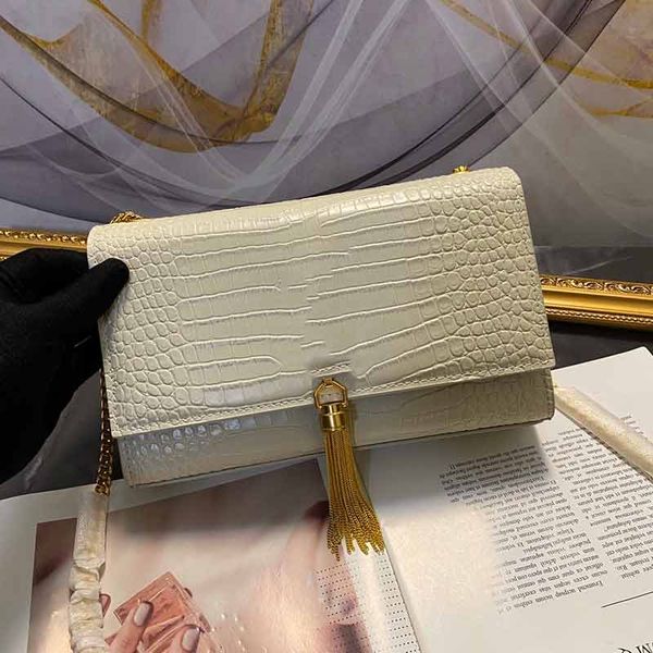designer luxury handbag purse y purse alligator women designer bag tassel style envelope style women designer bag 
designer luxury handbag purse y purse alligator women designer bag tassel style envelope style women designer bag