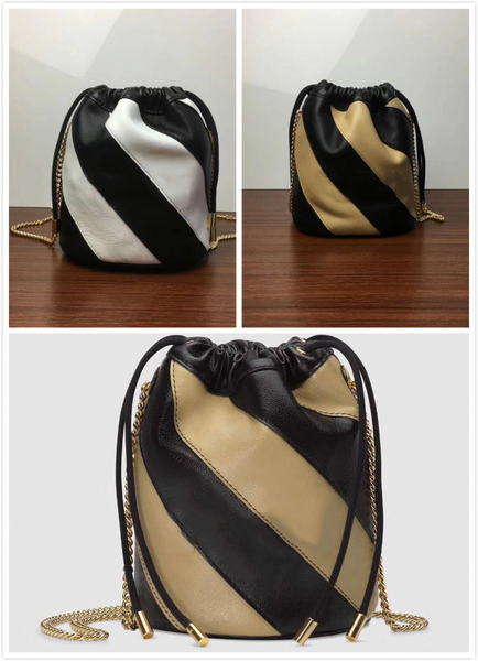 new designer handbag tote shoulder bag female slung bucket decorated with gold silver two tone interlocking style different shades of l1978#
new designer handbag tote shoulder bag female slung bucket decorated with gold silver two tone interlocking style different shades of l1978#