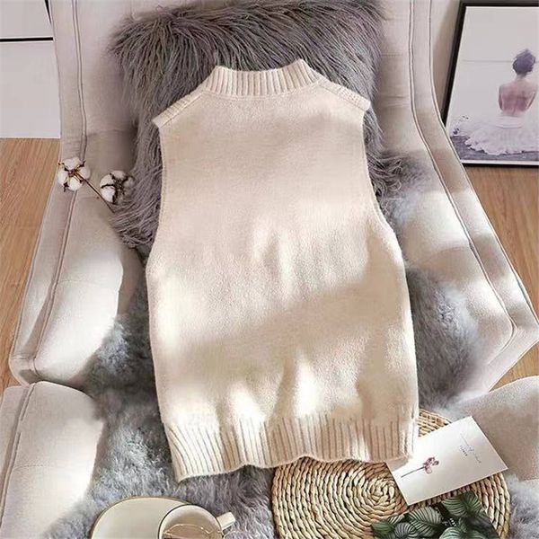 autumn winter basic women sleeveless knitted vest sweater casual pullover v-neck loose spring solid color jumper outwear, White;black
autumn winter basic women sleeveless knitted vest sweater casual pullover v-neck loose spring solid color jumper outwear, White;black