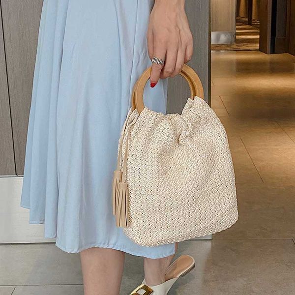 wooden handle shoulder bags for women 2020 fashion tassel handbags lady travel straw hand bag weave small hand bag totes
wooden handle shoulder bags for women 2020 fashion tassel handbags lady travel straw hand bag weave small hand bag totes