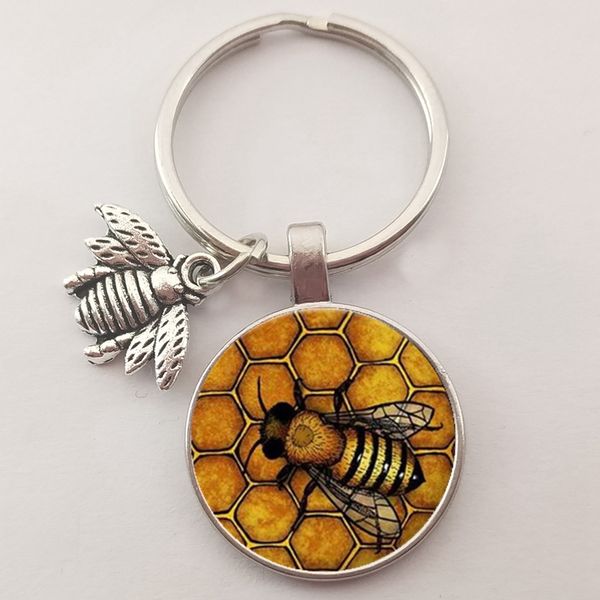 cute insect bee keychain fashion geometric honeycomb honey bee printed glass dome key ring chain bumble bee trinkets, Silver
cute insect bee keychain fashion geometric honeycomb honey bee printed glass dome key ring chain bumble bee trinkets, Silver