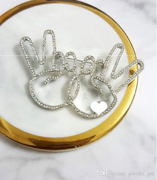 korea high-end fashion victory gesture diamond letter brooch wild creative pin suit jacket sweater accessories, Gray
korea high-end fashion victory gesture diamond letter brooch wild creative pin suit jacket sweater accessories, Gray