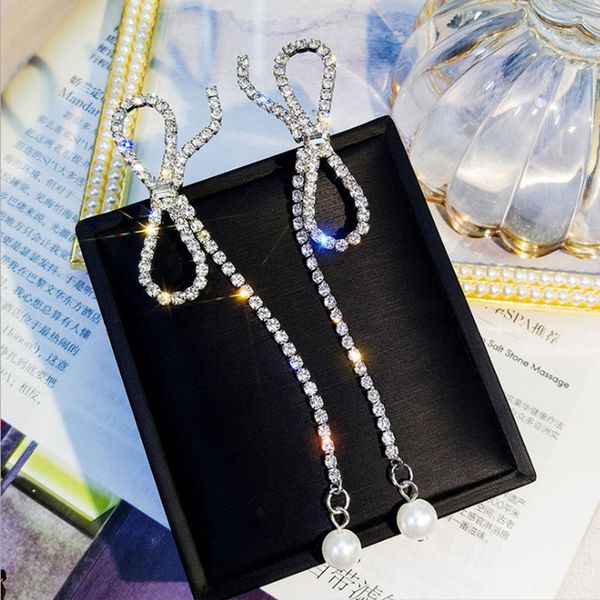 925 silver pearl bow earrings long elegant tassels ear stud japanese korean fashion network red cool earrings women's
925 silver pearl bow earrings long elegant tassels ear stud japanese korean fashion network red cool earrings women's