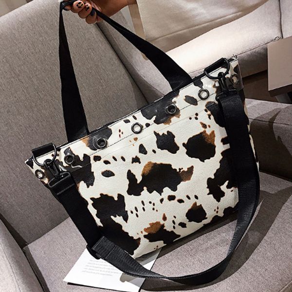 new cow pattern women handbags luxurious bamboo handle hand bags casual large capacity totes female bag
new cow pattern women handbags luxurious bamboo handle hand bags casual large capacity totes female bag