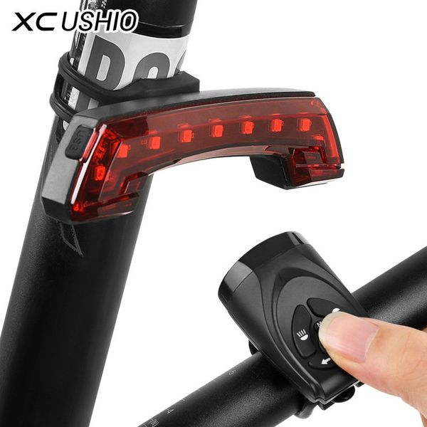 xc ushio usb rechargeable bicycle light wireless smart remote control turn signal tail light horn bike led lamp bike accessories 
xc ushio usb rechargeable bicycle light wireless smart remote control turn signal tail light horn bike led lamp bike accessories
