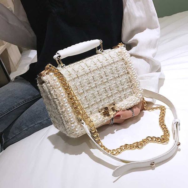 fashion pearls woolen women shoulder bags handbags chains ladies crossbody bag small flap winter purses 2019 sac
fashion pearls woolen women shoulder bags handbags chains ladies crossbody bag small flap winter purses 2019 sac