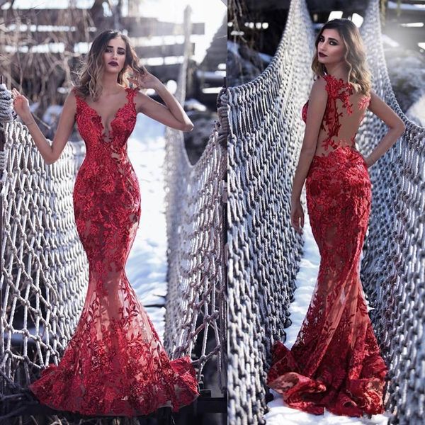 Tony Chaaya Sexy Red Mermaid Prom Dresses Lace Appliqued Sheer V Neck Formal Evening Gowns Long Sweep Train Illusion Party Dresses 
Tony Chaaya Sexy Red Mermaid Prom Dresses Lace Appliqued Sheer V Neck Formal Evening Gowns Long Sweep Train Illusion Party Dresses