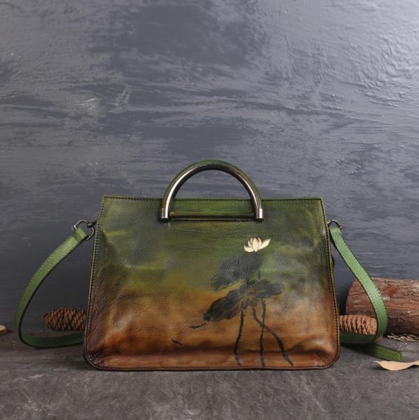 european and american retro trend new product first layer leather personality shoulder bag female ethnic style lotus handmade bag fashion re
european and american retro trend new product first layer leather personality shoulder bag female ethnic style lotus handmade bag fashion re