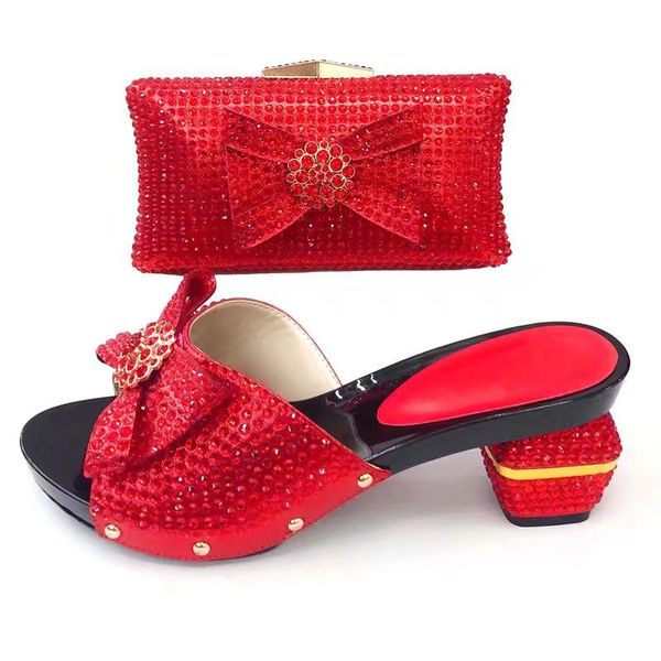 beautiful red women sandals and bag with rhinestone decoration african bowtie shoes match handbag set v1072-1,heel 7.5cm
beautiful red women sandals and bag with rhinestone decoration african bowtie shoes match handbag set v1072-1,heel 7.5cm