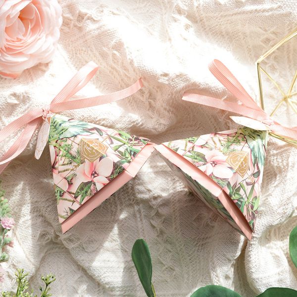 50pcs new europe triangular pyramid style candy dragee box wedding party supplies paper flower gift boxes with ribbon packaging
50pcs new europe triangular pyramid style candy dragee box wedding party supplies paper flower gift boxes with ribbon packaging