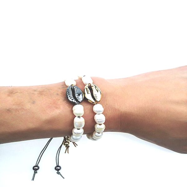 bohemian puka natural kauri shiny bracelet female baroque bracelet, pearl jewelry bracelet jewelry coquillages, Golden;silver
bohemian puka natural kauri shiny bracelet female baroque bracelet, pearl jewelry bracelet jewelry coquillages, Golden;silver