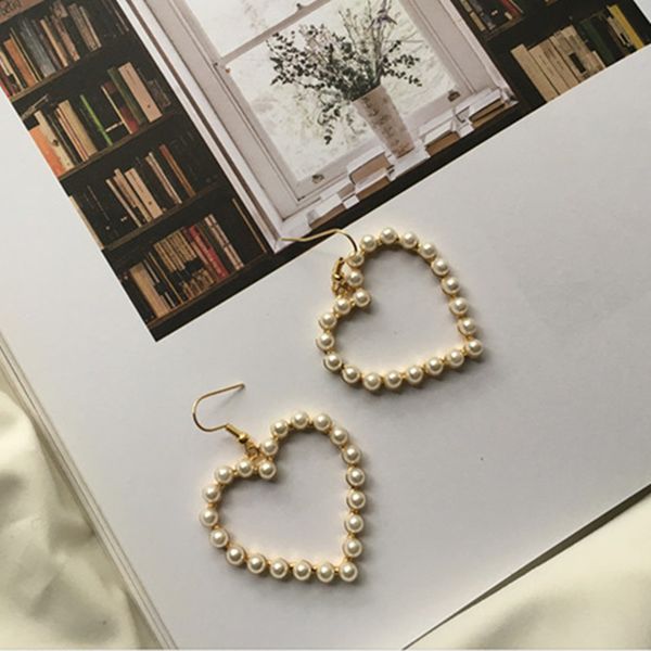 New Arrival Imitation Pearl Heart Shape Hollow Earrings For Women Korean Style Bead Earrings Wedding Party Earrings E0286
New Arrival Imitation Pearl Heart Shape Hollow Earrings For Women Korean Style Bead Earrings Wedding Party Earrings E0286
