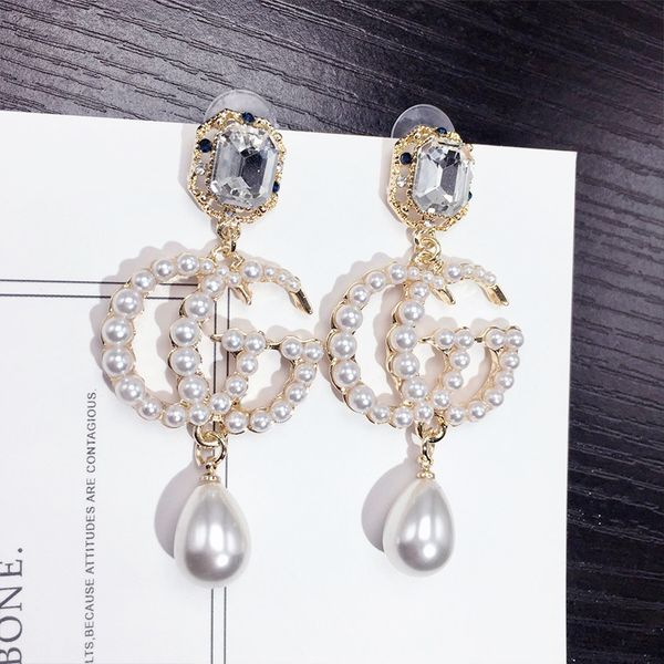 De igner fa hion ta el pendant earring luxury to create ladie elegant earring alloy ear hook, Golden;silver
De igner fa hion ta el pendant earring luxury to create ladie elegant earring alloy ear hook, Golden;silver