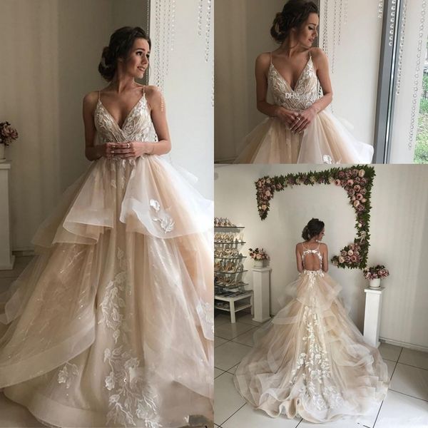 2019 vintage champagne a line wedding dresses v neck spaghetti straps appliques lace tulle tiered backless bridal gowns
2019 vintage champagne a line wedding dresses v neck spaghetti straps appliques lace tulle tiered backless bridal gowns