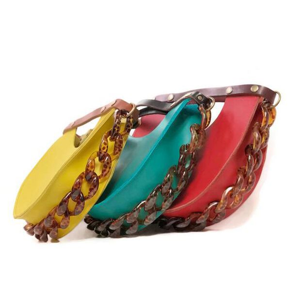 the est brand high-quality ladies shoulder bag the most popular semicircle saddle bag fashionable acrylic chain handbag wicker stud bag
the est brand high-quality ladies shoulder bag the most popular semicircle saddle bag fashionable acrylic chain handbag wicker stud bag
