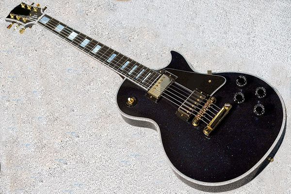 Whole ale cu tom handmade olid mahogany body black parkle glo fini h electric guitar
Whole ale cu tom handmade olid mahogany body black parkle glo fini h electric guitar