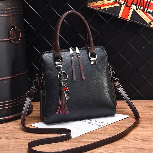мода женщин сумка tassel pu кожаная сумка топ-ручка простого pure color плечо сумки crossbody сумка болс feminina
мода женщин сумка tassel pu кожаная сумка топ-ручка простого pure color плечо сумки crossbody сумка болс feminina