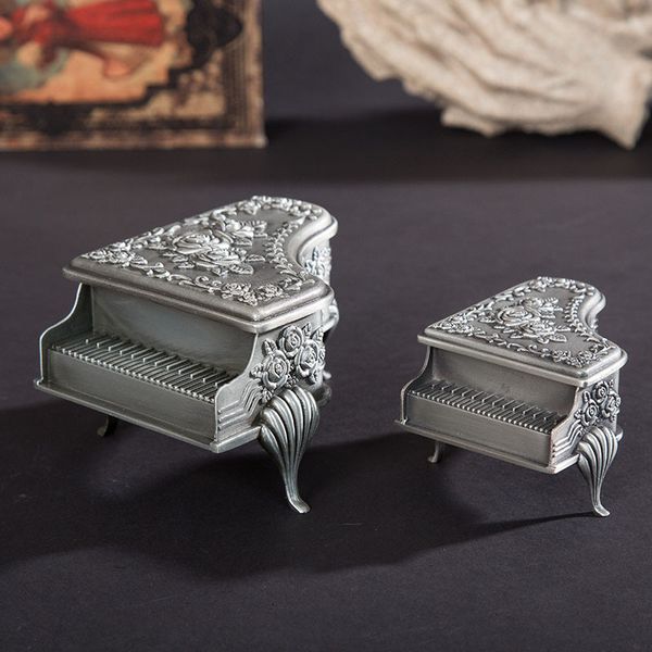 european luxury metal cosmetic box piano jewelry box carved rose storage ring earrings box decoration
european luxury metal cosmetic box piano jewelry box carved rose storage ring earrings box decoration
