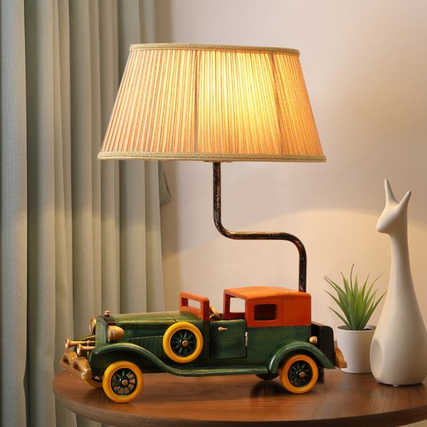 new design creative novelty luxury wooden car table lamps with fabric lampshade vintage led desk light for bedroom nightstand study room
new design creative novelty luxury wooden car table lamps with fabric lampshade vintage led desk light for bedroom nightstand study room