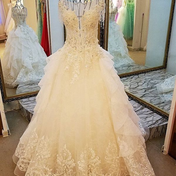 a-line wedding gowns cake style o-neck cap sleeves illusion back lace wedding dress for bridal floor length applique dress, White
a-line wedding gowns cake style o-neck cap sleeves illusion back lace wedding dress for bridal floor length applique dress, White